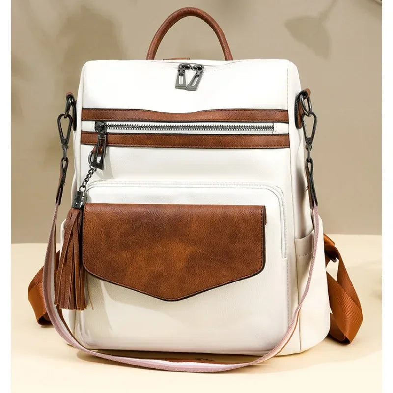 2025 new women's pu leather waterproof anti-theft fashion tassel two-color large travel college backpack wallet shoulder bag