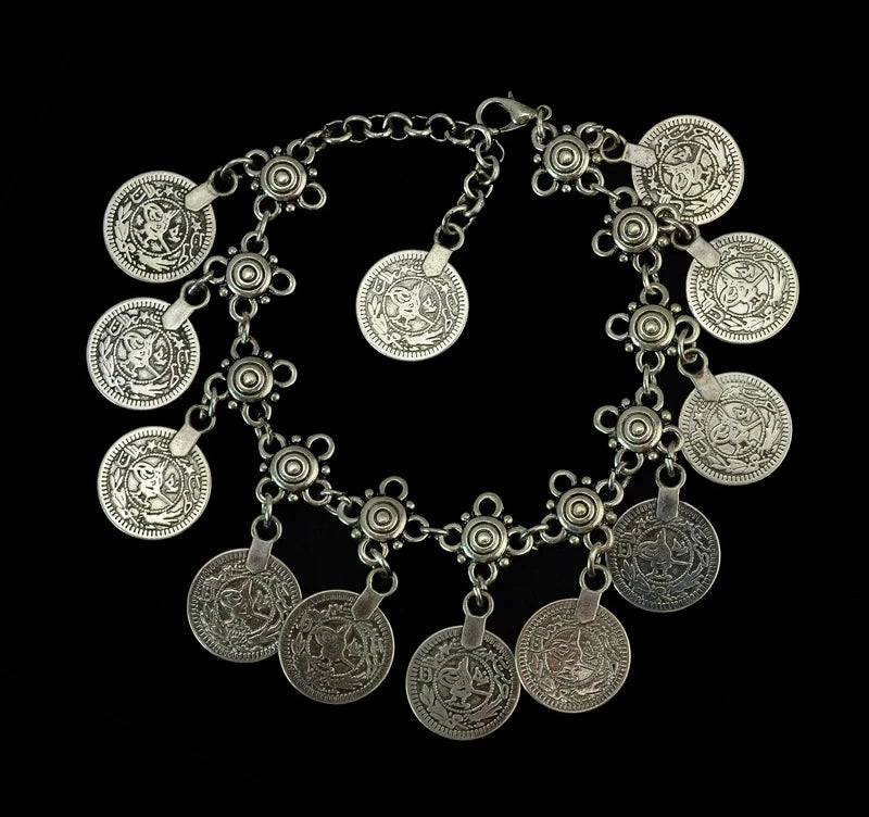 Vintage silver coin bracelet for women, featuring a boho beach, Turkish, ethnic, tribal, elegant design; vintage Tibetan bangles; Indian jewelry.